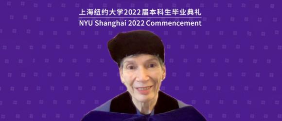 Provost Joanna Waley-Cohen addresses the class of 2022 in her violet regalia. 