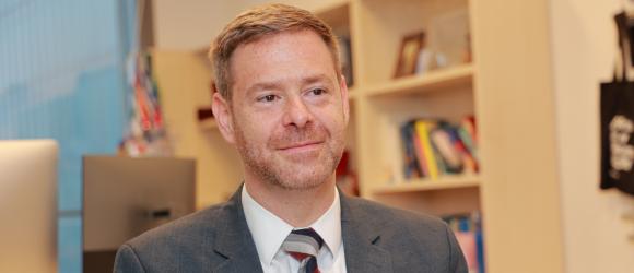 Hall in his office at NYU Shanghai