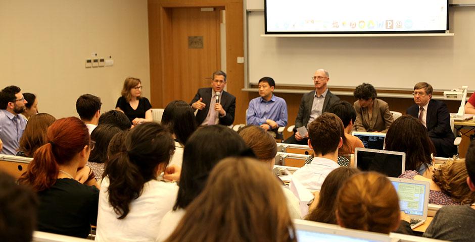 NYU Shanghai faculty gather for a forum discussion covering important academic topics such as major requirements, study away restrictions, e-books, and more. May 7, 2015. (Photo by Annie Seaman)