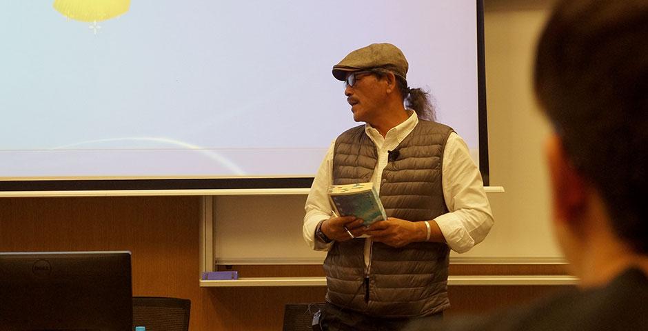 Syaman Rapongan, award-winning writer from the indigenous Tao tribe of Orchid Island, reads excerpts from his latest book, 'Dream Ocean.' April 22, 2015. (Photo by Charlotte San Juan)