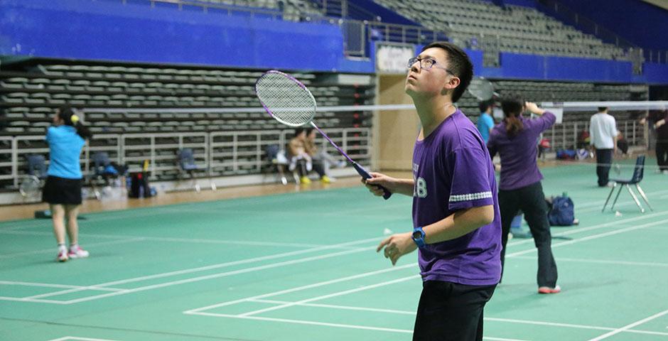 Students compete in the final round of the Intramural Badminton Tournament at Yuanshen Sports Centre Stadium. March 12, 2015. (Photo by Kevin Pham)