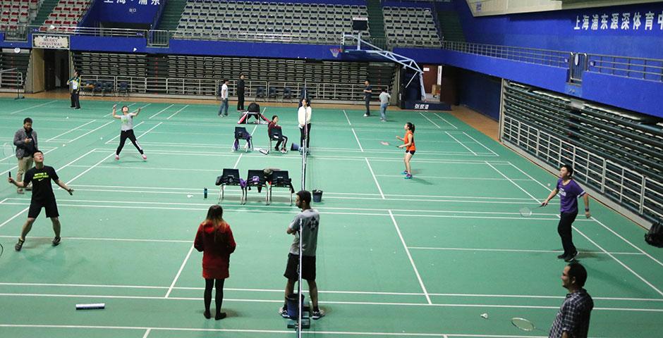 Students compete in the final round of the Intramural Badminton Tournament at Yuanshen Sports Centre Stadium. March 12, 2015. (Photo by Kevin Pham)