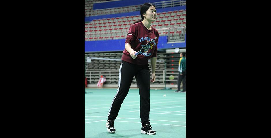 Students compete in the final round of the Intramural Badminton Tournament at Yuanshen Sports Centre Stadium. March 12, 2015. (Photo by Kevin Pham)