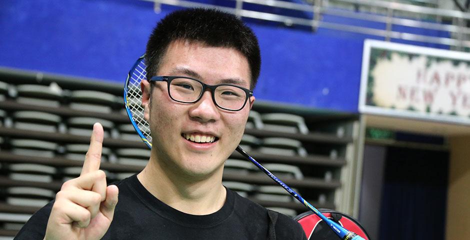 Students compete in the final round of the Intramural Badminton Tournament at Yuanshen Sports Centre Stadium. March 12, 2015. (Photo by Kevin Pham)