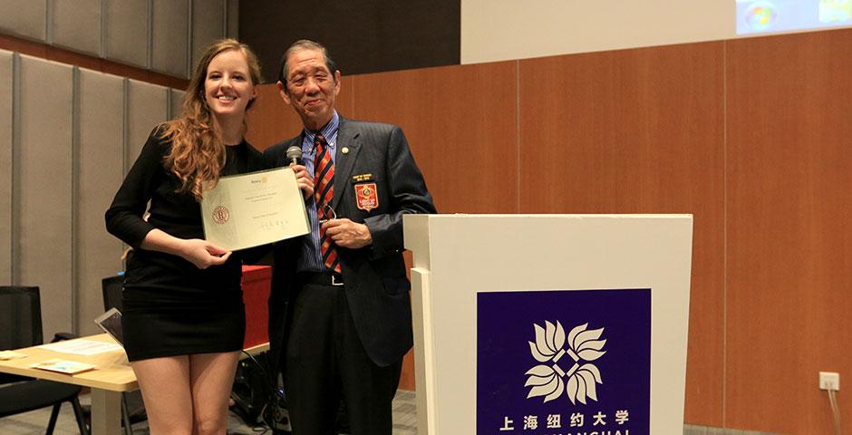 The NYU Shanghai community honors those impacted by the devastating Nepal earthquake with a candlelight vigil and a benefit event hosted in conjunction with the Rotary of Shanghai. May 10, 2015. (Photo by Ng Meizhi)