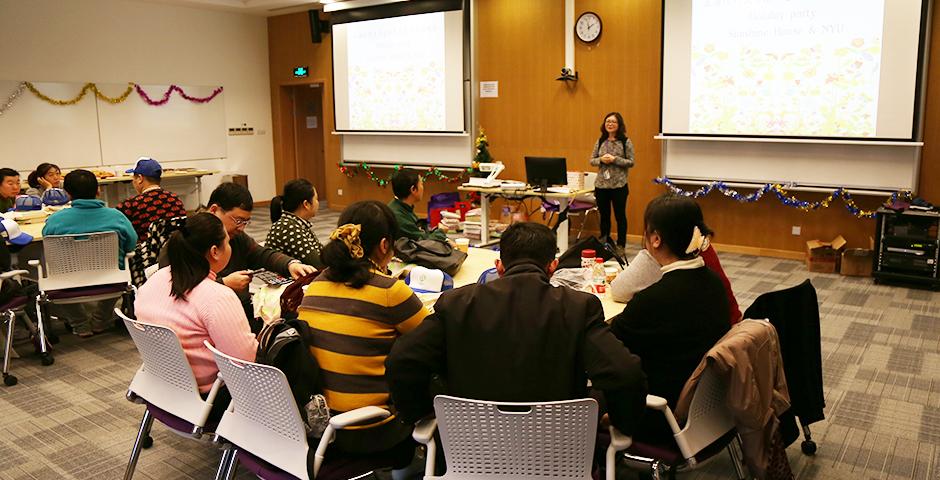 On the afternoon of December 10, the NYU Shanghai community welcomed members of the Lujiazui and Jinqiao Sunshine House to celebrate the coming holiday season by exchanging handmade gifts, sharing holiday stories and singing songs together. (Photo by: NYU Shanghai)