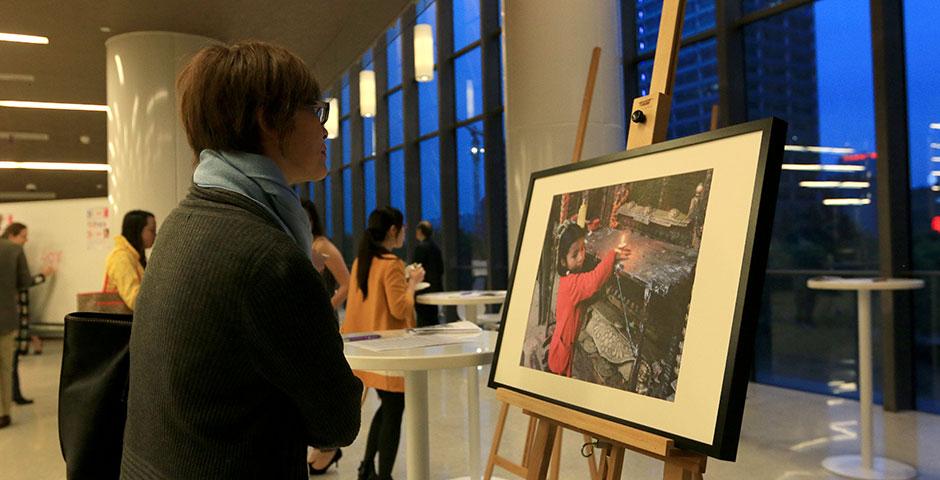 The NYU Shanghai community honors those impacted by the devastating Nepal earthquake with a candlelight vigil and a benefit event hosted in conjunction with the Rotary of Shanghai. May 10, 2015. (Photo by Ng Meizhi)