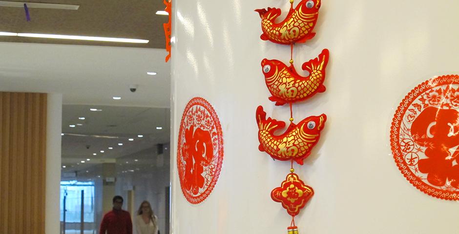 Student activities marking the celebration of Chinese New Year included paper-cutting craft workshops, games and scroll painting. (Photo by: NYU Shanghai)