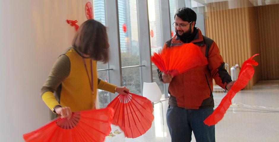 Student activities marking the celebration of Chinese New Year included paper-cutting craft workshops, games and scroll painting. (Photo by: NYU Shanghai)