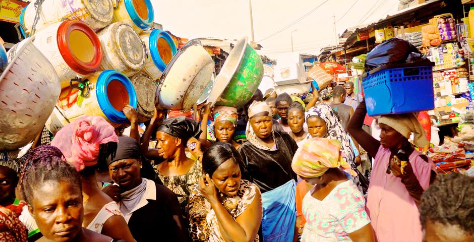 By Mark West (Accra)    "Buying Mangoes in Kumasi"   Bustling West African Market, hundreds fill the streets, carrying pots on their heads, moving fast in the heat.