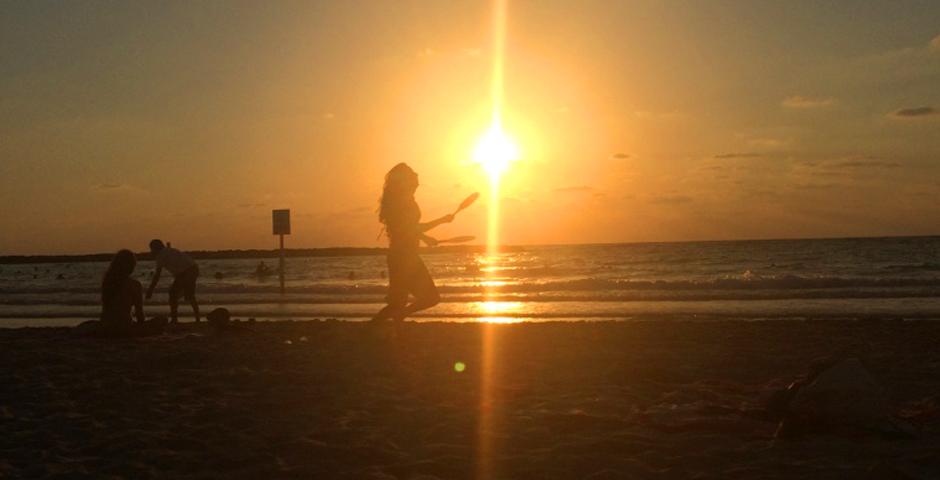 By Julie Hauge (Tel Aviv)  Playing Matkot as the sun sets on the beaches in Tel Aviv. Matkot is a very popular paddle game in Israel, usually played on the beach and often gets quite competitive.