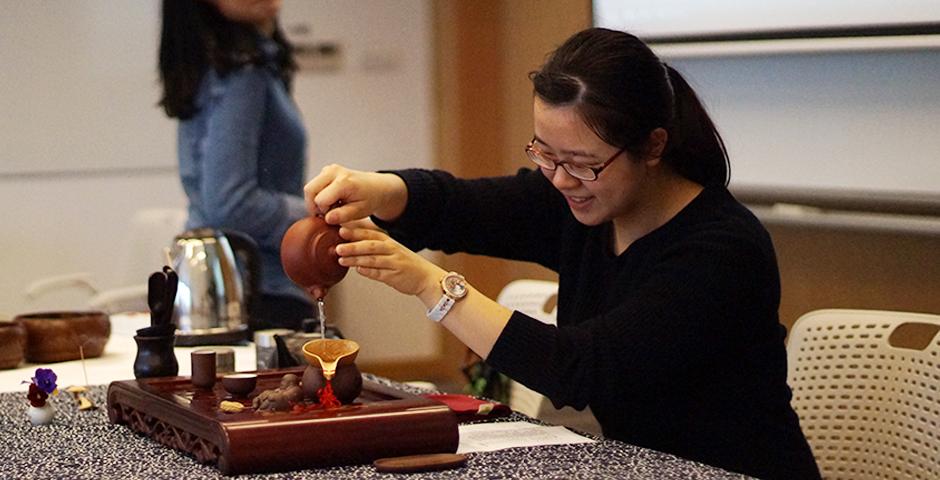 Steeped in tradition, students honed their tea ceremony technique at an April 13 workshop hosted by Food & Festivals and Heath and Wellness. (Photo by: NYU Shanghai)