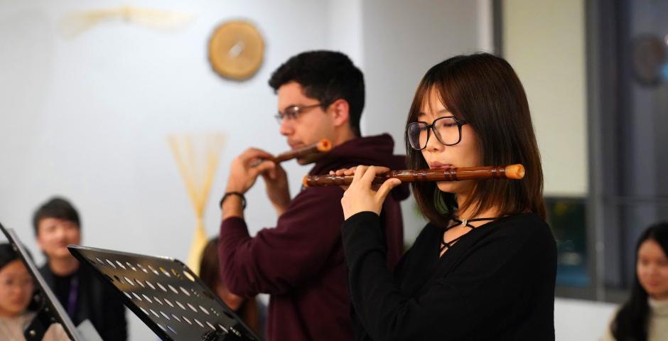 Tony Carapia Valle ’21 and Zeping Fei ’20 played a duet of “My Heart Still” during the Bamboo Flute class final performance held in the World Languages Lounge on December 10.