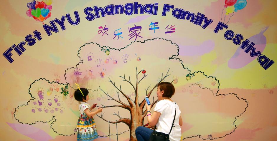 Families of NYU Shanghai faculty and staff gathered on September 10 for a morning of activities ranging from hula hoop challenges to competitive team calligraphy. (Photo by: NYU Shanghai)