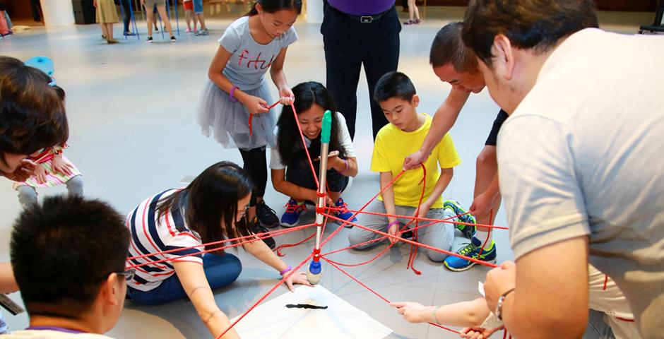 Families of NYU Shanghai faculty and staff gathered on September 10 for a morning of activities ranging from hula hoop challenges to competitive team calligraphy. (Photo by: NYU Shanghai)