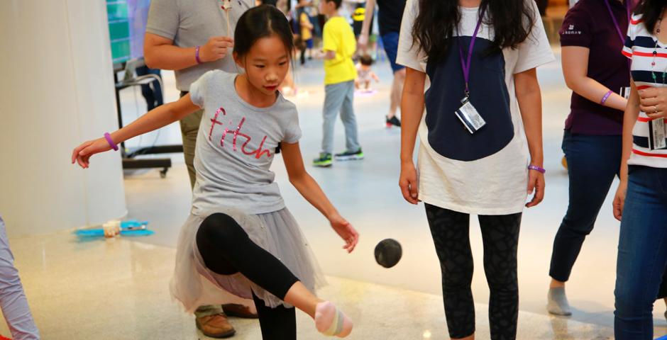 Families of NYU Shanghai faculty and staff gathered on September 10 for a morning of activities ranging from hula hoop challenges to competitive team calligraphy. (Photo by: NYU Shanghai)