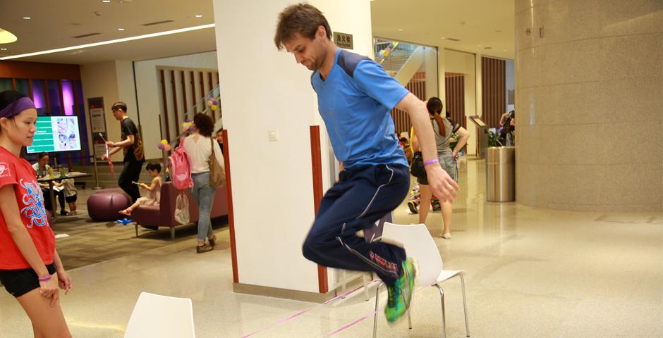 Families of NYU Shanghai faculty and staff gathered on September 10 for a morning of activities ranging from hula hoop challenges to competitive team calligraphy. (Photo by: NYU Shanghai)