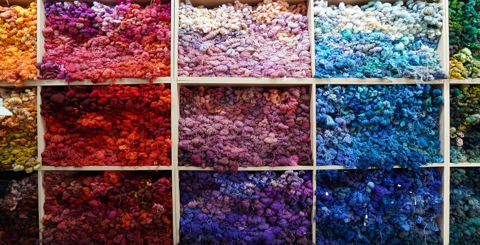 A wall of hand-dyed yarn. Director Bao explained that all of the yarn used for weaving is hand-dyed in batches “as small as a bowl of noodles.”