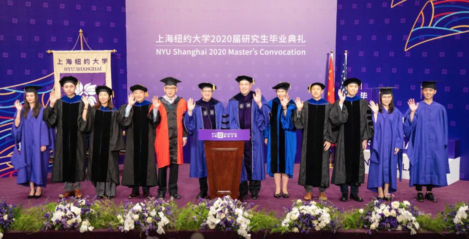 The platform party included NYU Shanghai leadership, faculty representatives, and student representatives.