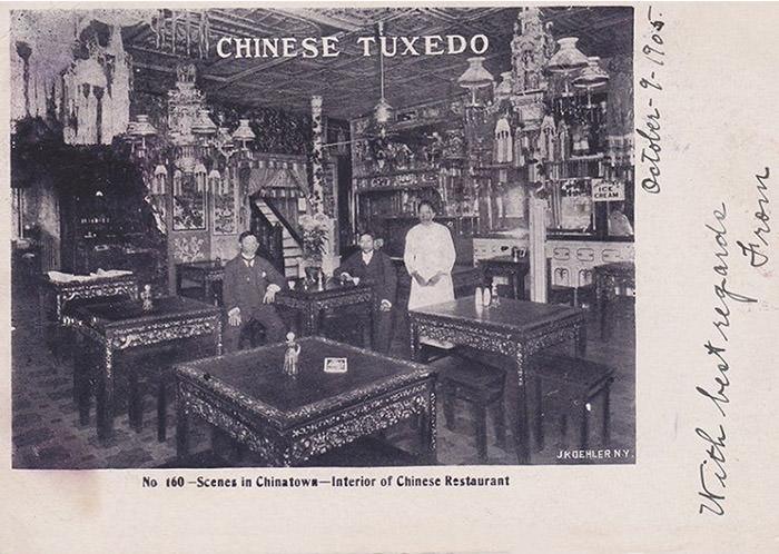 Historical photo of richly decorated Chinese restaurant in late 19th century